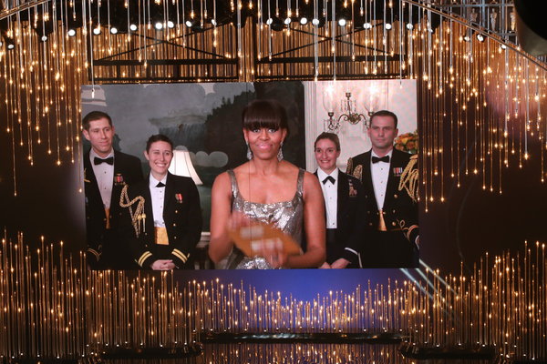 Not even Barack is as in love with Michelle Obama as the woman on her left