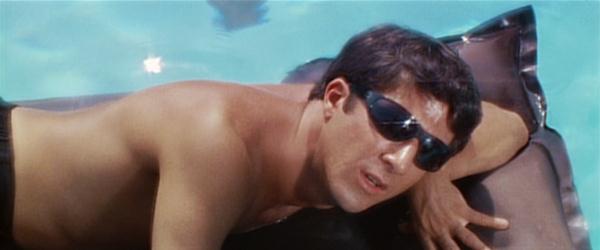 Benjamin's life: lying in the pool and visiting Mrs. Robinson